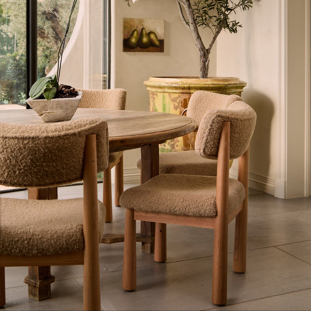 https://cdn.shopify.com/s/files/1/0593/2217/1565/files/beige-boucle-dining-chairs-beautiful.jpg?v=1764628161