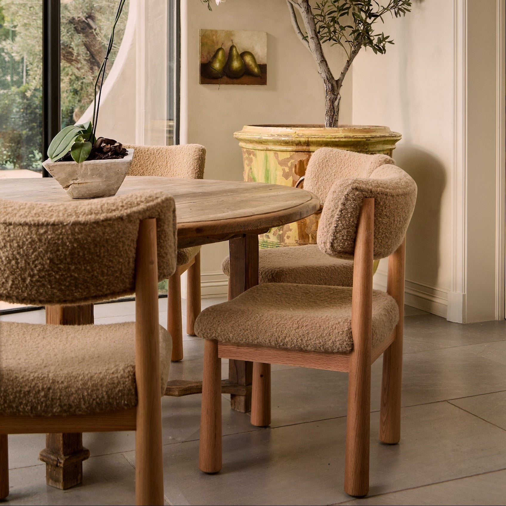 https://cdn.shopify.com/s/files/1/0593/2217/1565/files/beige-boucle-dining-chairs-beautiful.jpg?v=1764628161