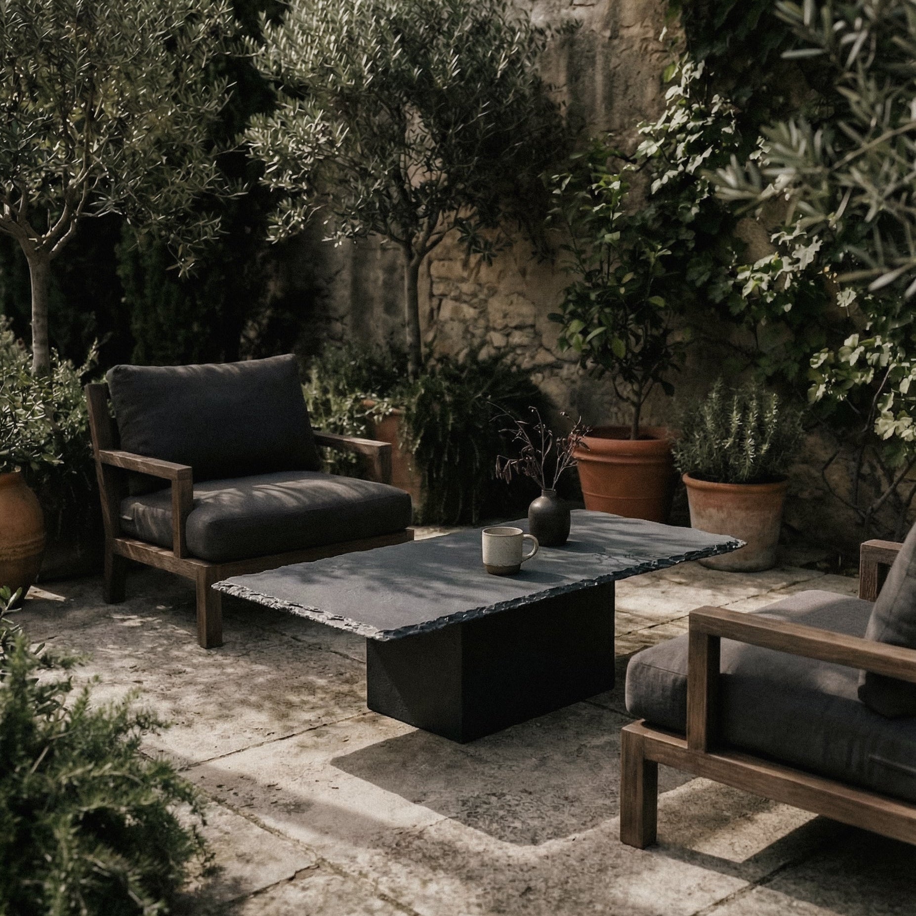 https://cdn.shopify.com/s/files/1/0593/2217/1565/files/black-limestone-coffee-table-outdoor.jpg?v=1768333171