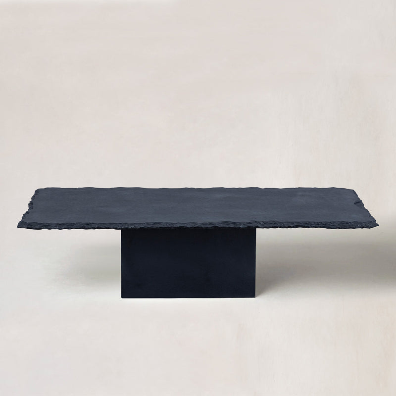 https://cdn.shopify.com/s/files/1/0593/2217/1565/files/black-limestone-coffee-table-raw-edge2.jpg?v=1759265557