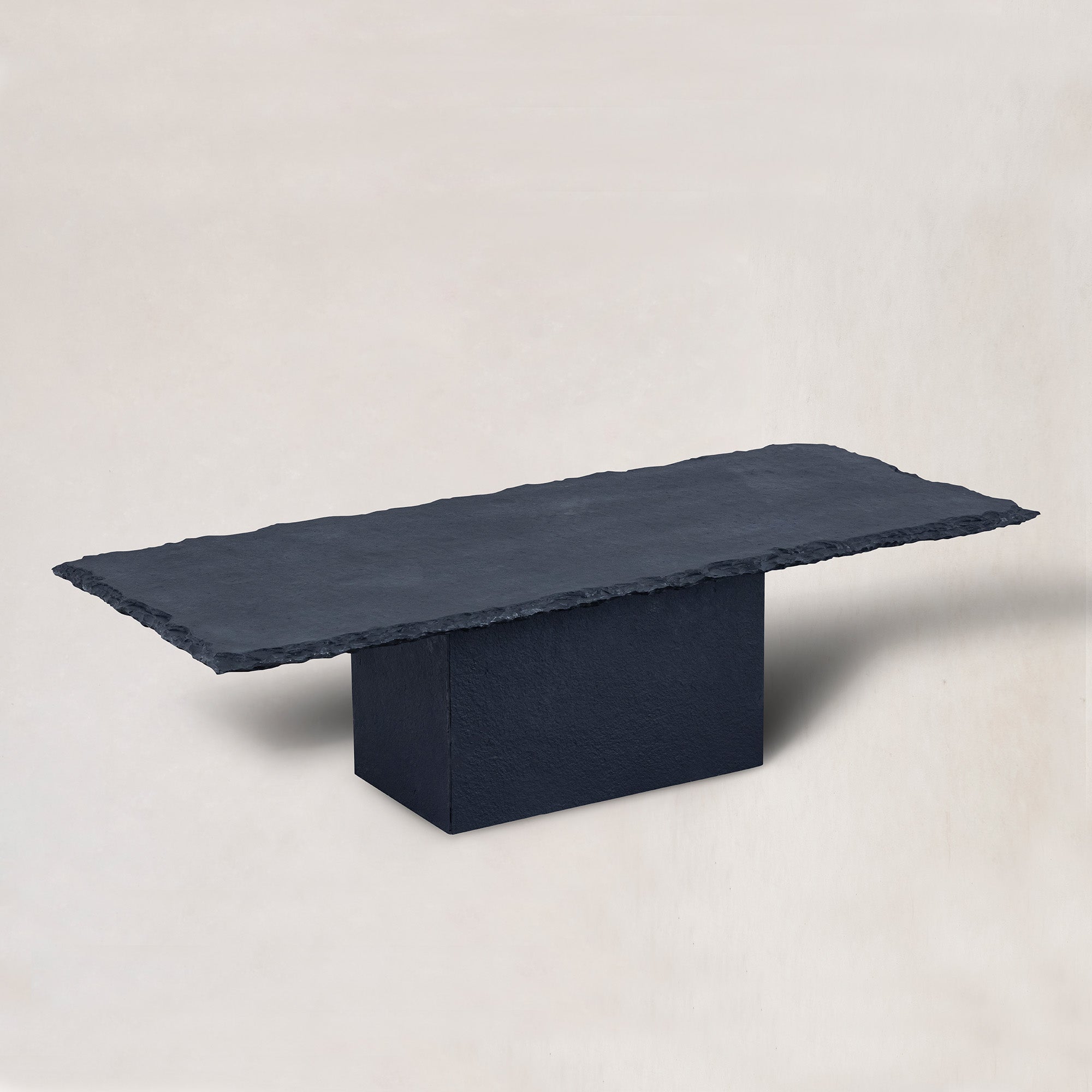 https://cdn.shopify.com/s/files/1/0593/2217/1565/files/black-limestone-coffee-table-raw-edge4.jpg?v=1767639620