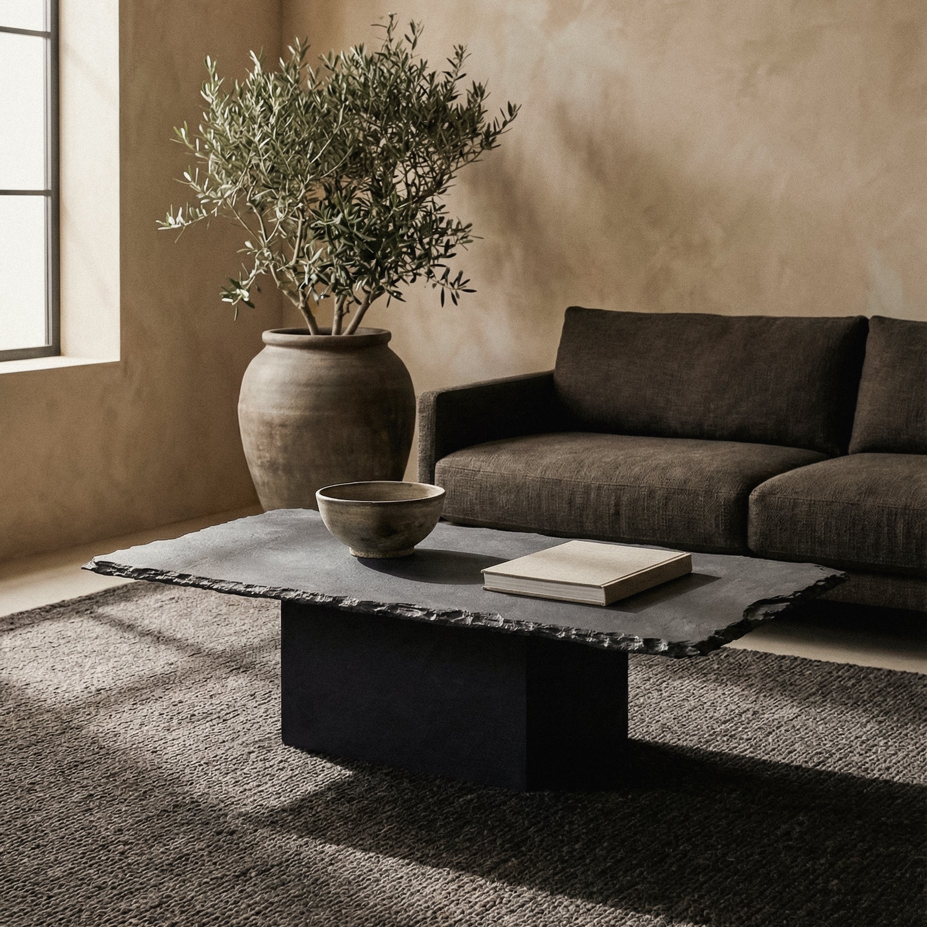 https://cdn.shopify.com/s/files/1/0593/2217/1565/files/black-limestone-coffee-table.jpg?v=1768333171