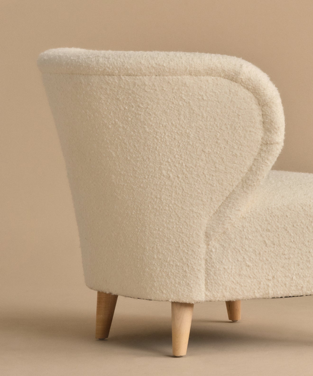 https://cdn.shopify.com/s/files/1/0565/1234/8333/files/brentwood-chair-ivory-wool-boucle-10.jpg?v=1760568323