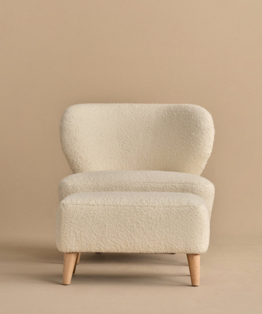 https://cdn.shopify.com/s/files/1/0565/1234/8333/files/brentwood-chair-ivory-wool-boucle-11.jpg?v=1760568351
