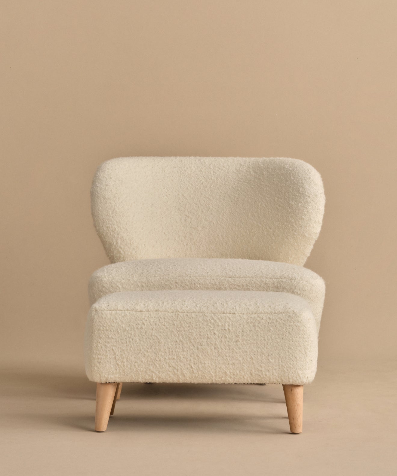https://cdn.shopify.com/s/files/1/0565/1234/8333/files/brentwood-chair-ivory-wool-boucle-11.jpg?v=1760568351