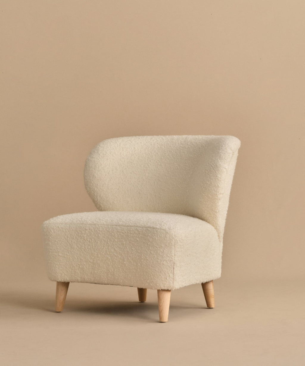 https://cdn.shopify.com/s/files/1/0565/1234/8333/files/brentwood-chair-ivory-wool-boucle-7.jpg?v=1760568294