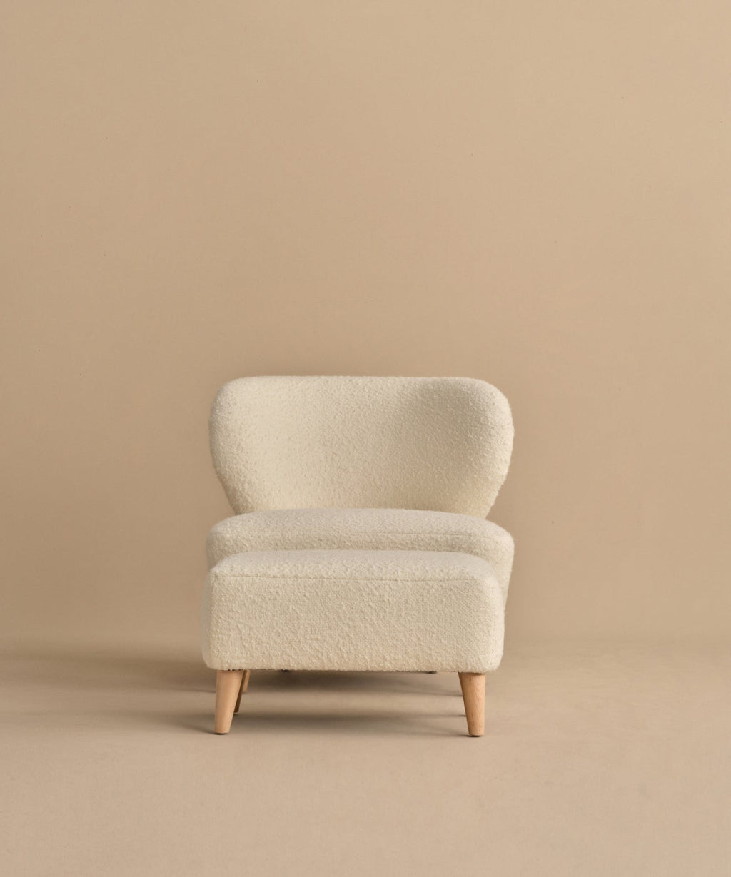 https://cdn.shopify.com/s/files/1/0565/1234/8333/files/brentwood-chair-ivory-wool-boucle-7_1.jpg?v=1760568496