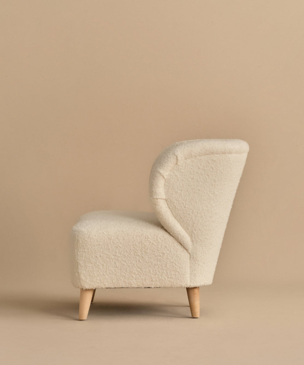 https://cdn.shopify.com/s/files/1/0565/1234/8333/files/brentwood-chair-ivory-wool-boucle-8.jpg?v=1760568303