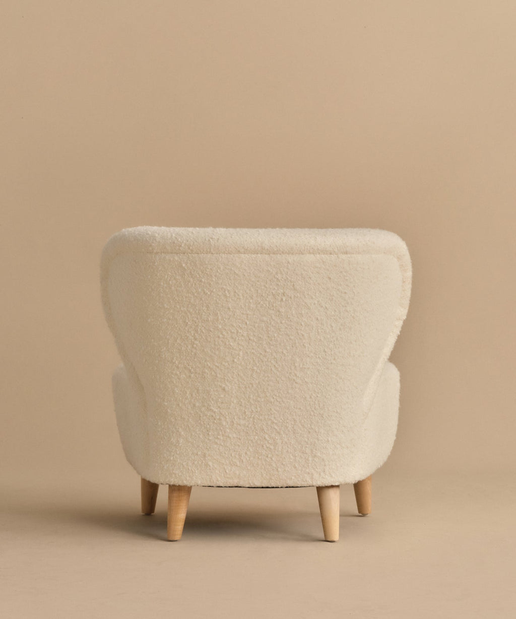 https://cdn.shopify.com/s/files/1/0565/1234/8333/files/brentwood-chair-ivory-wool-boucle-9.jpg?v=1760568315