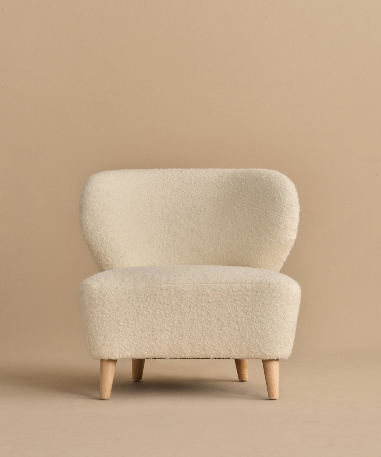 https://cdn.shopify.com/s/files/1/0565/1234/8333/files/brentwood-chair-ivory-wool-boucle_a7422ae4-4c87-4513-9d09-3df7d5543ff0.jpg?v=1760568220