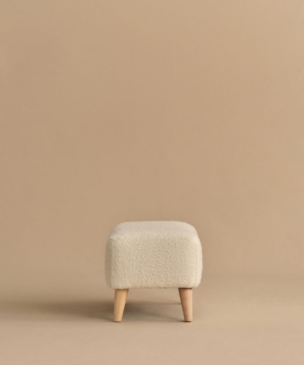 https://cdn.shopify.com/s/files/1/0565/1234/8333/files/brentwood-ottoman-ivory-wool-boucle-5.jpg?v=1760568488