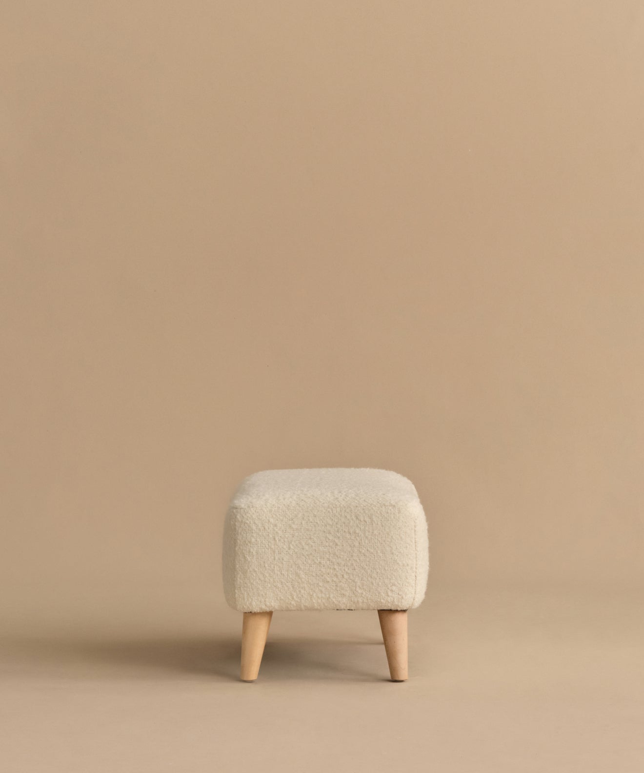 https://cdn.shopify.com/s/files/1/0565/1234/8333/files/brentwood-ottoman-ivory-wool-boucle-5.jpg?v=1760568488