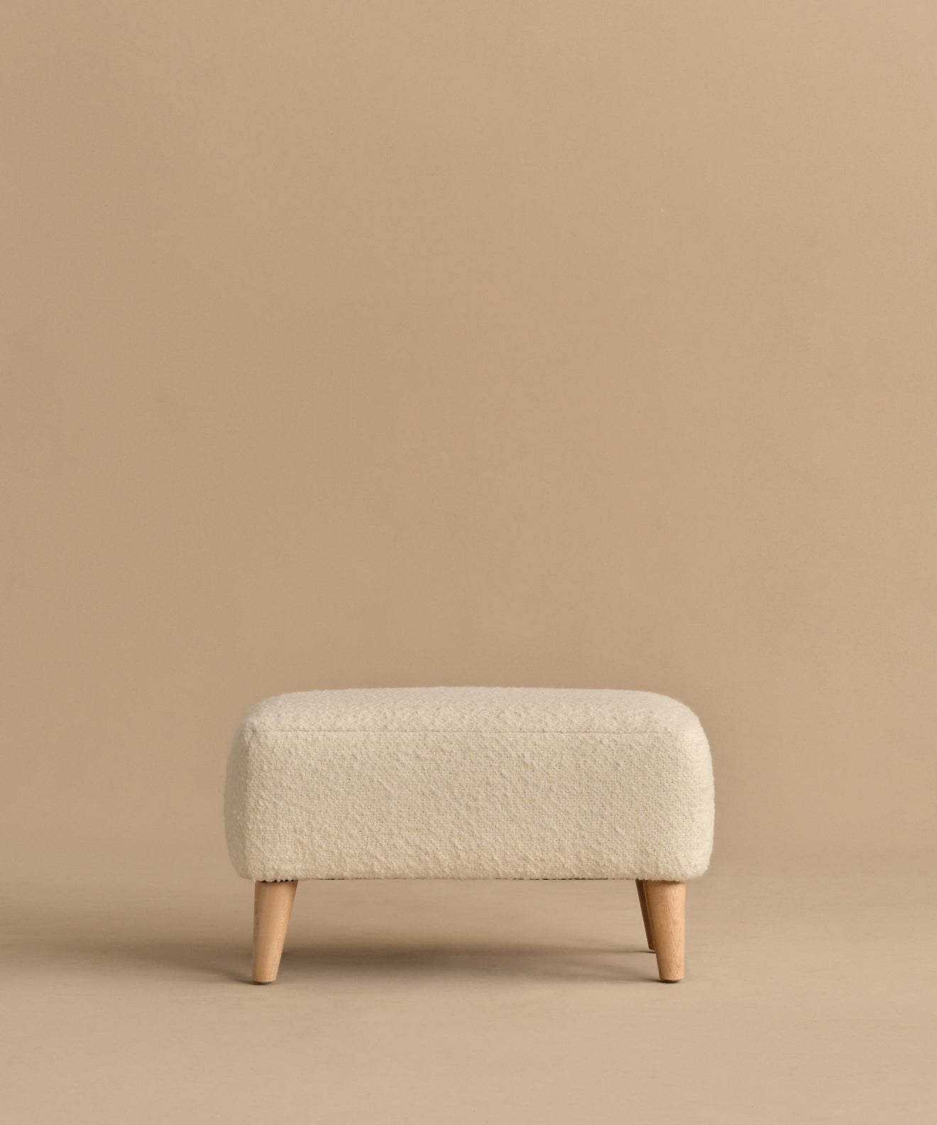 https://cdn.shopify.com/s/files/1/0565/1234/8333/files/brentwood-ottoman-ivory-wool-boucle.jpg?v=1760568472