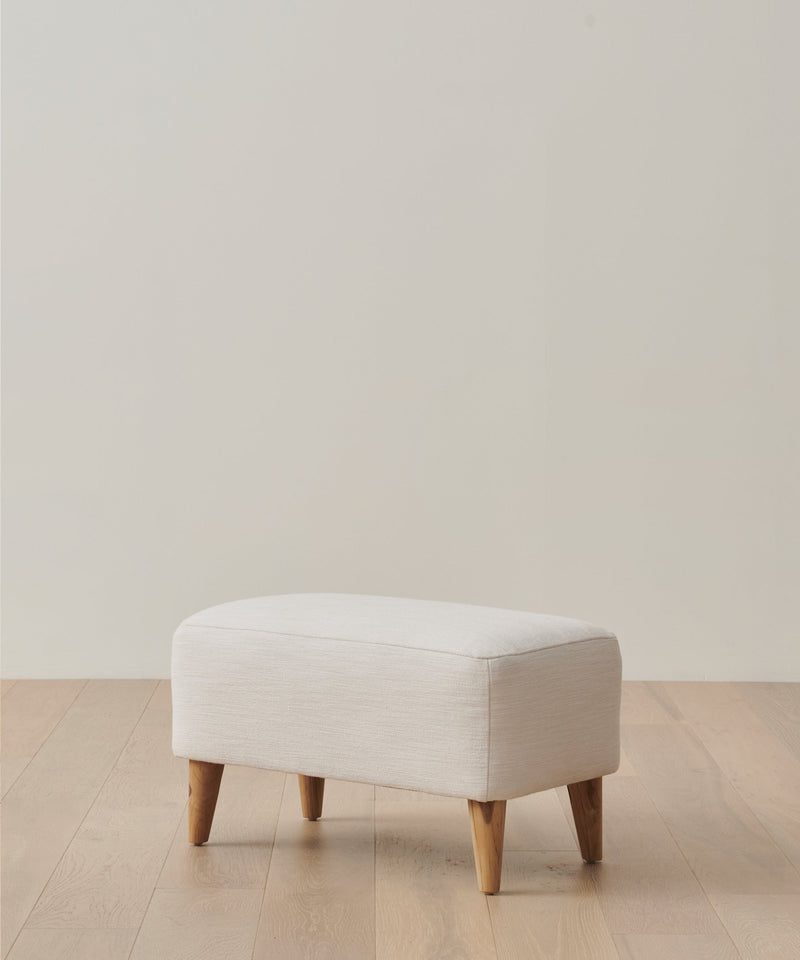 https://cdn.shopify.com/s/files/1/0565/1234/8333/files/brentwood-ottoman-performance-ivory-1.jpg?v=1762183174