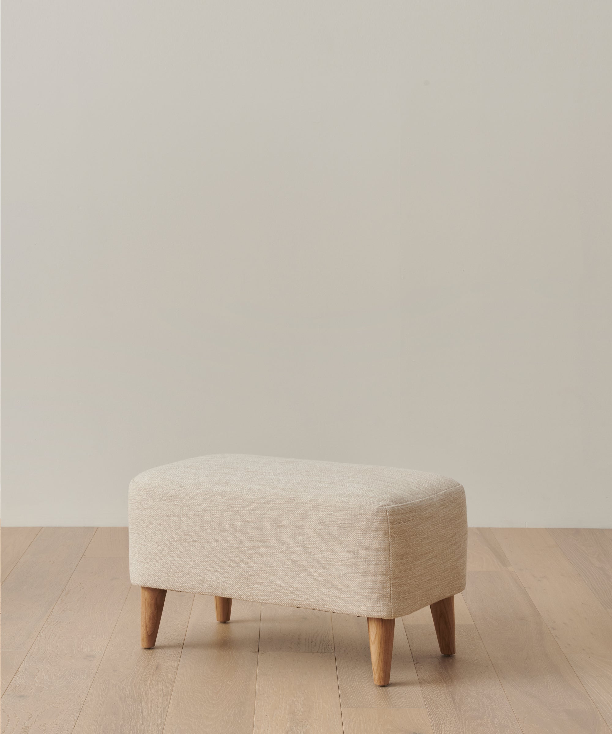 https://cdn.shopify.com/s/files/1/0565/1234/8333/files/brentwood-ottoman-performance-natural-1.jpg?v=1762183180