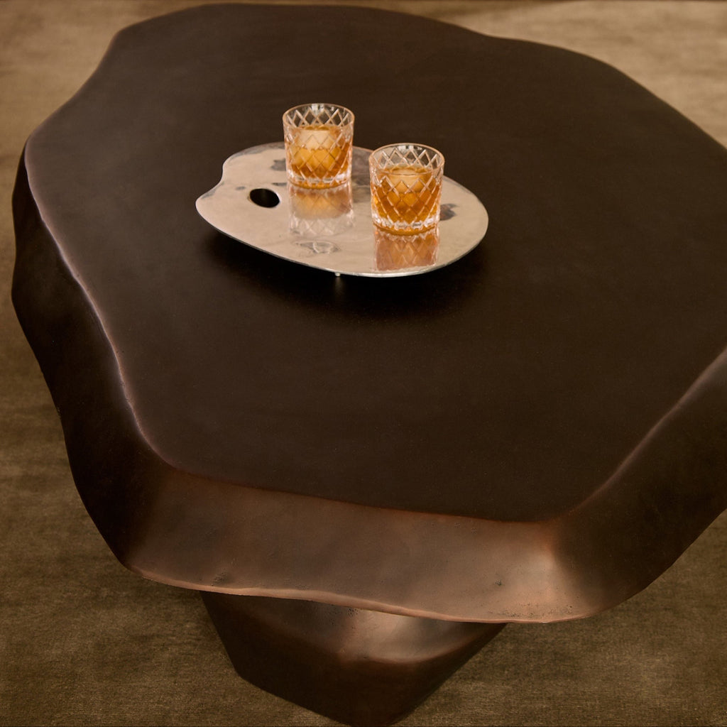 https://cdn.shopify.com/s/files/1/0593/2217/1565/files/bronze-meteorite-coffee-table.jpg?v=1770947804