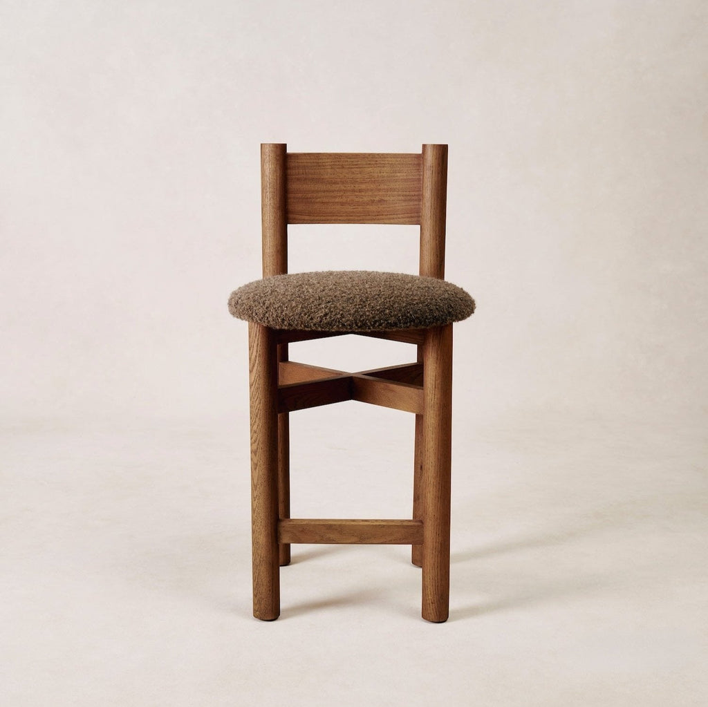 https://cdn.shopify.com/s/files/1/0593/2217/1565/files/brown-counter-stool-boucle.jpg?v=1765301776