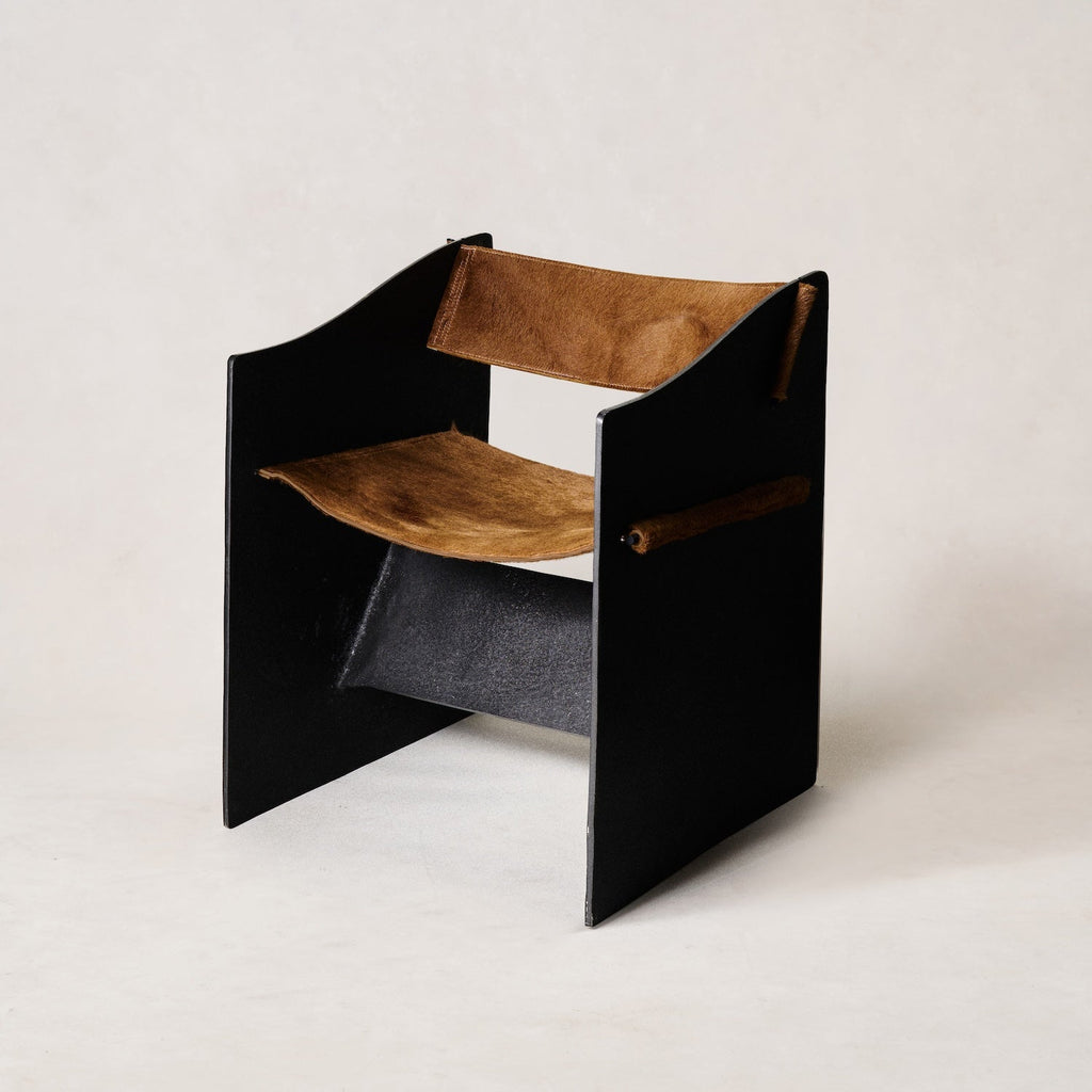https://cdn.shopify.com/s/files/1/0593/2217/1565/files/brutalist-ingresso-accent-chair-whiskey-hair-on-hide-whiskey-12_1202fbfe-3097-4030-a3c2-f93653652a20.jpg?v=1753822707