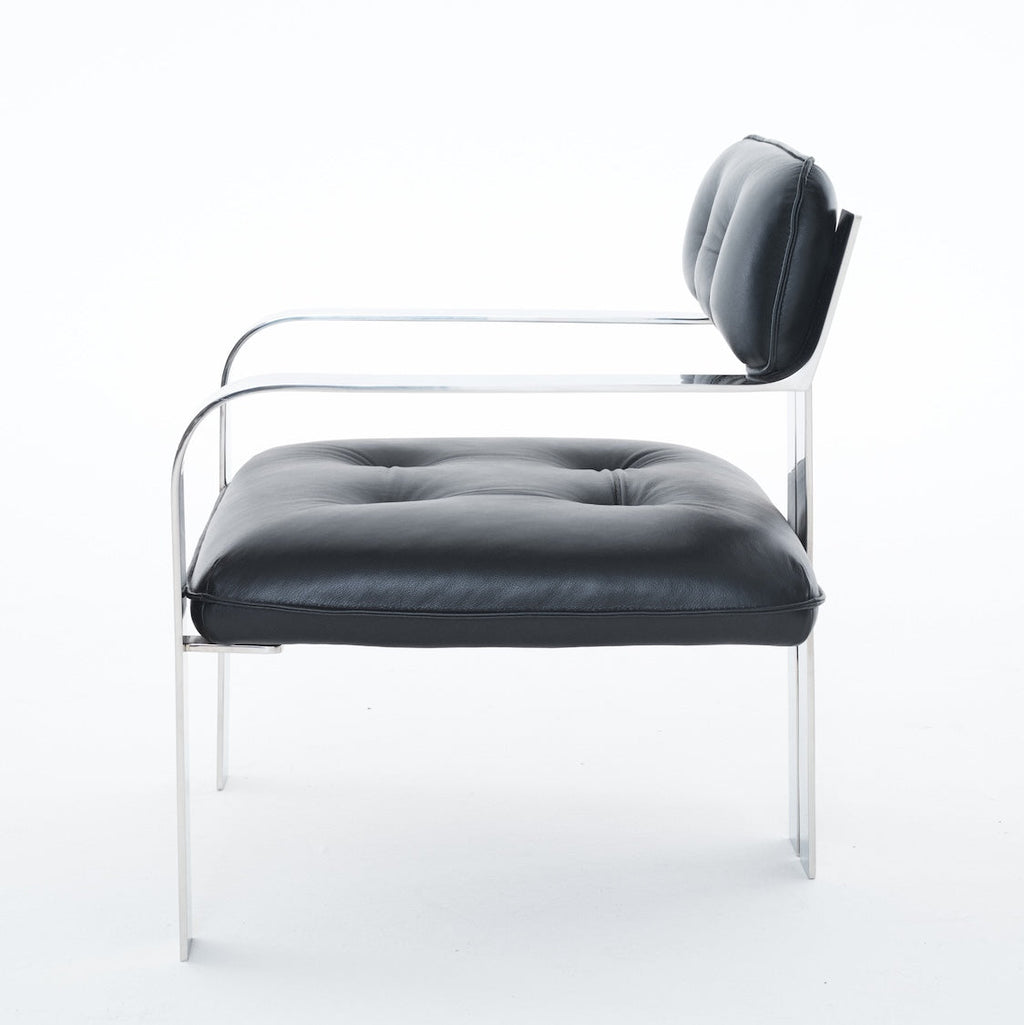 https://cdn.shopify.com/s/files/1/0593/2217/1565/files/chrome-black-leather-chair-house-of-leon.jpg?v=1746634622
