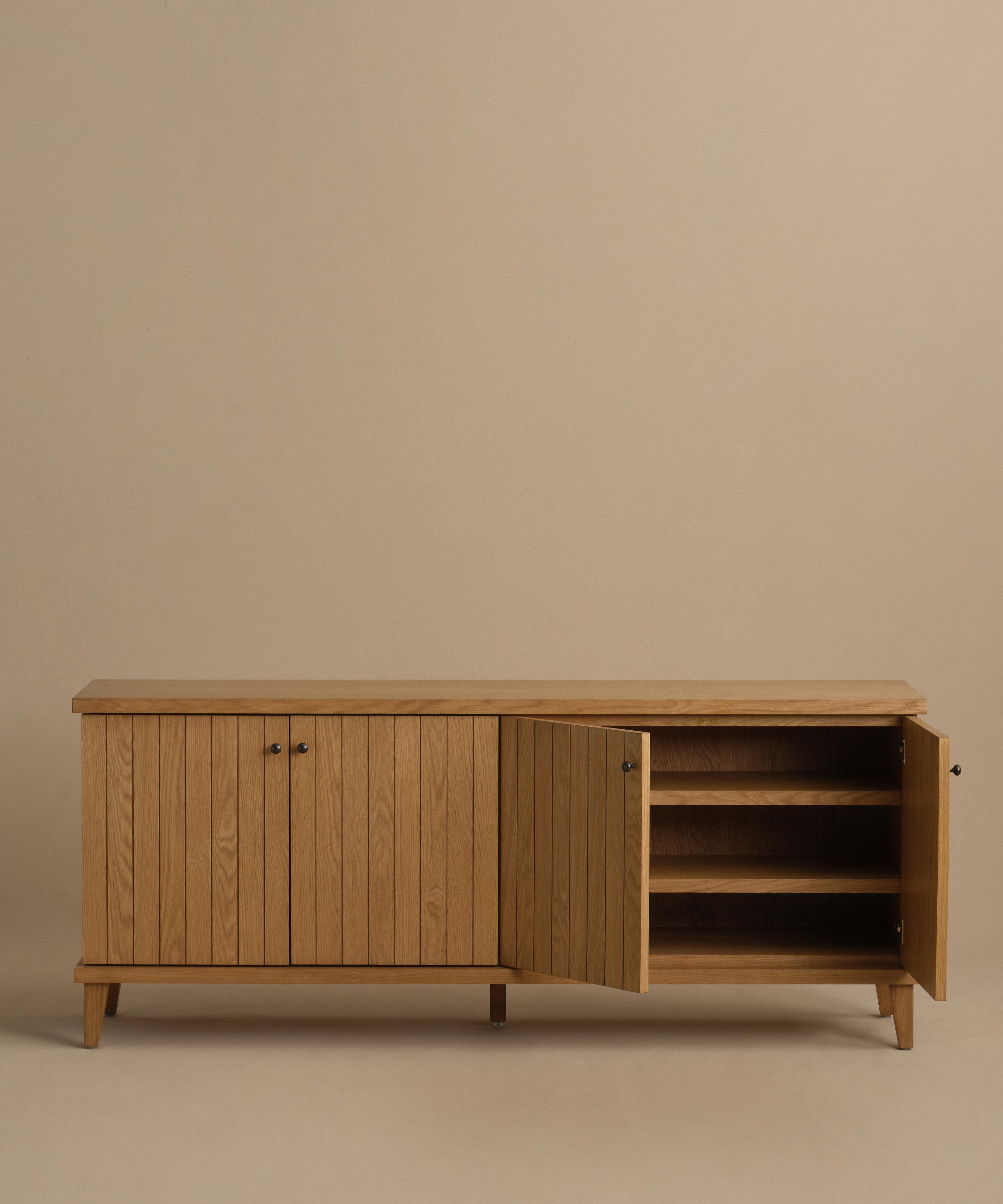 https://cdn.shopify.com/s/files/1/0565/1234/8333/files/coast-sideboard-warm-oak-5.jpg?v=1757451057