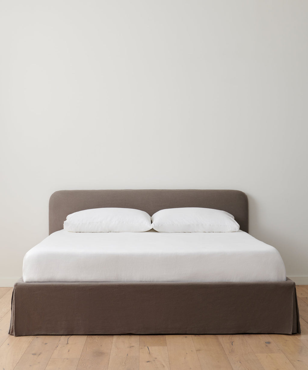 https://cdn.shopify.com/s/files/1/0565/1234/8333/products/cove-bed-charcoal-linen-1.jpg?v=1762182765
