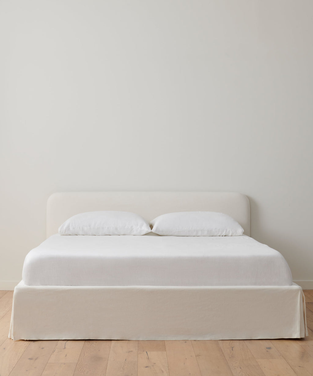 https://cdn.shopify.com/s/files/1/0565/1234/8333/products/cove-bed-ivory-linen-1.jpg?v=1762182764