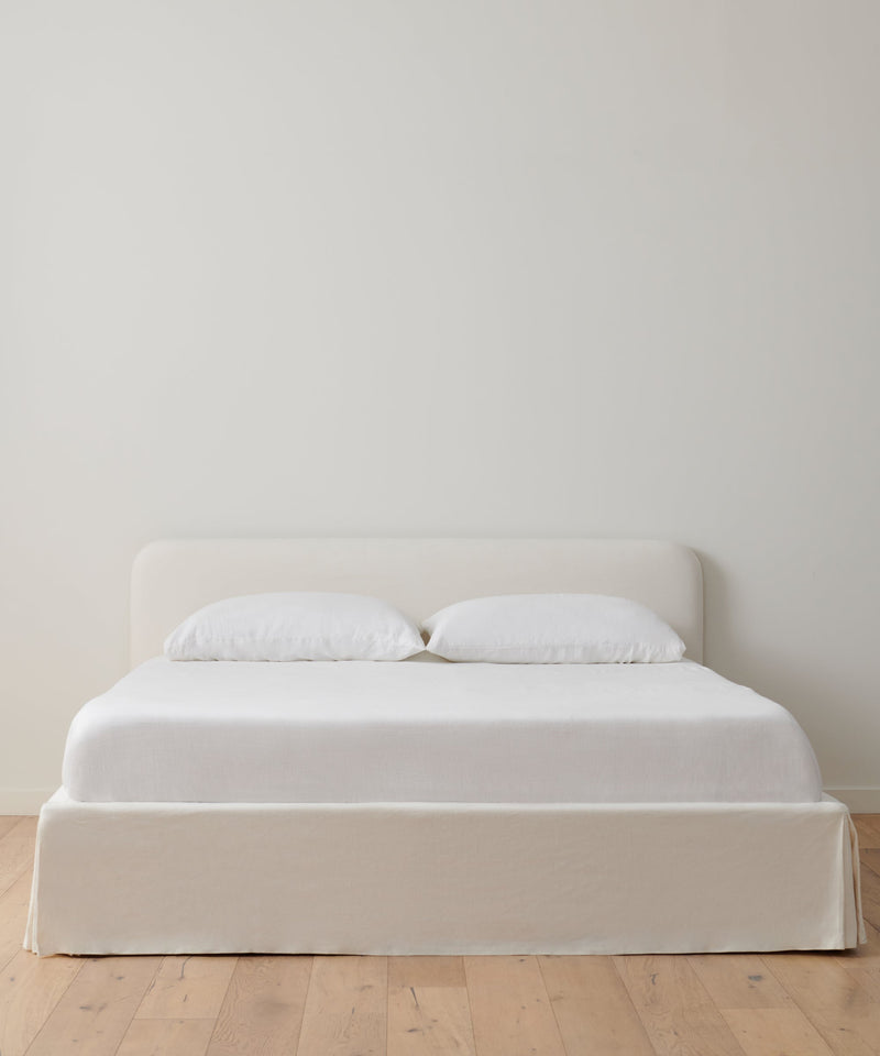 https://cdn.shopify.com/s/files/1/0565/1234/8333/products/cove-bed-ivory-linen-1.jpg?v=1762182764
