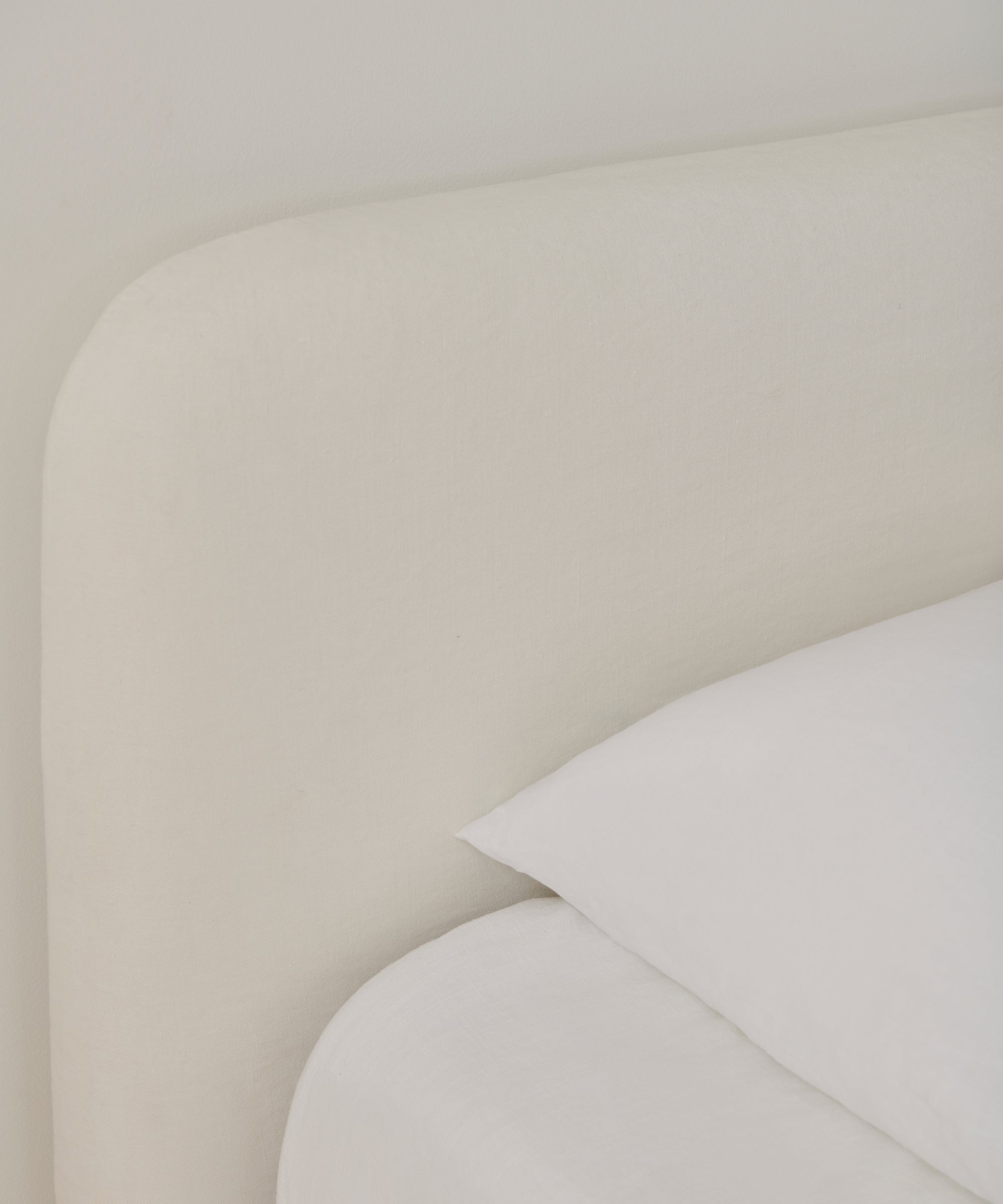 https://cdn.shopify.com/s/files/1/0565/1234/8333/products/cove-bed-ivory-linen-2.jpg?v=1658850010