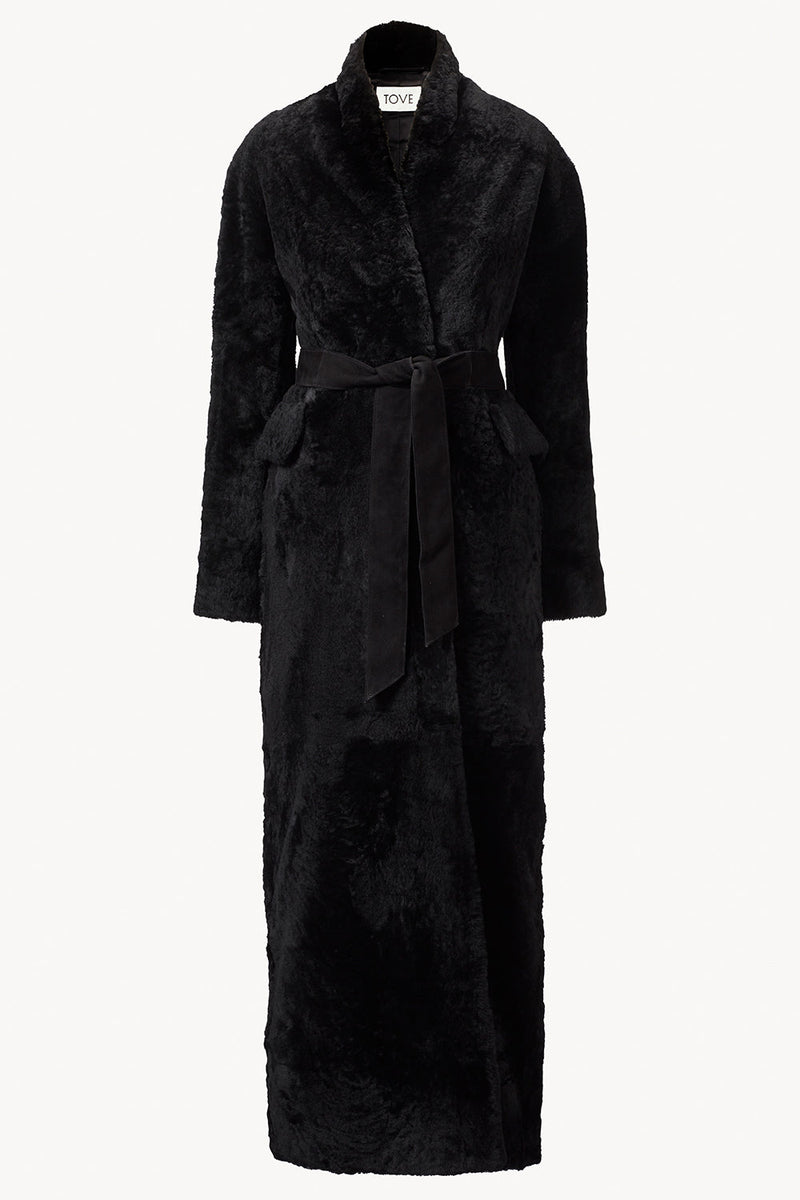 https://cdn.shopify.com/s/files/1/0155/8868/7920/files/emily_shearling_tove.jpg?v=1710886755