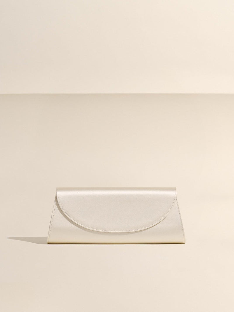 https://cdn.shopify.com/s/files/1/0607/2283/9806/files/hunting-season-the-opera-clutch-in-satin-champagne-3157504.jpg?v=1772128887
