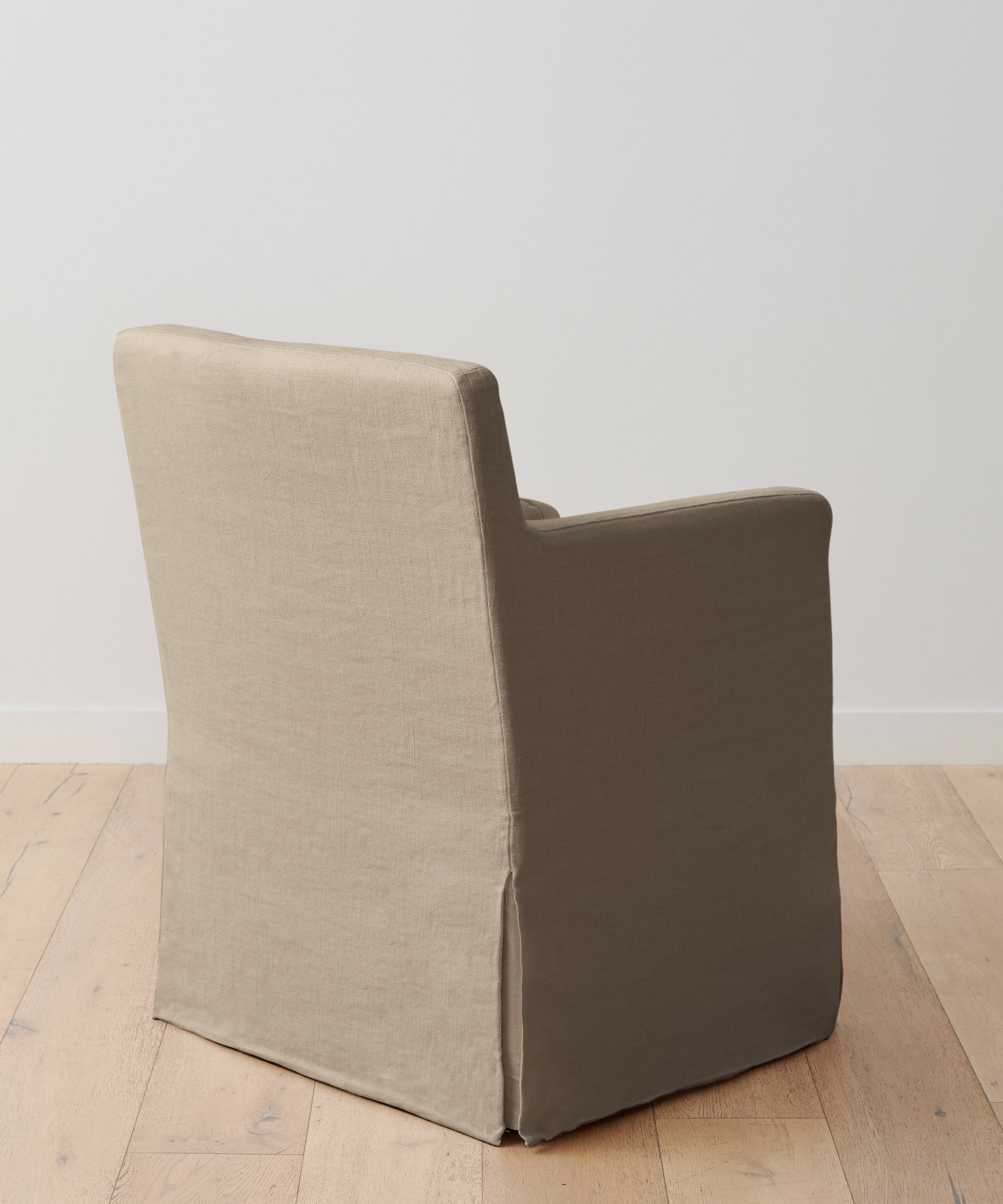 https://cdn.shopify.com/s/files/1/0565/1234/8333/products/linen-sunset-dining-arm-chair-taupe-updated-4.jpg?v=1678144530