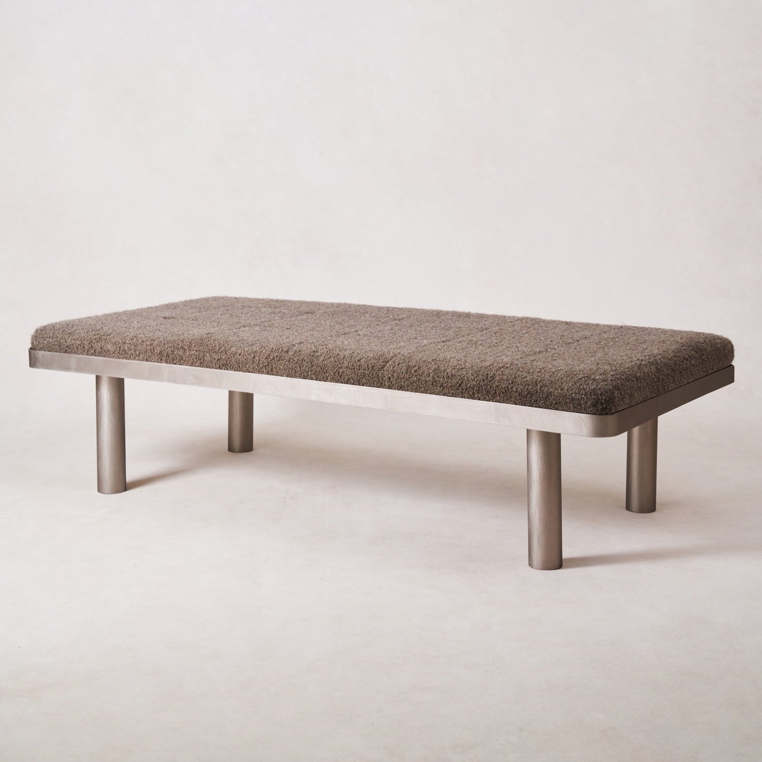 https://cdn.shopify.com/s/files/1/0593/2217/1565/files/milan-stainless-steel-mocha-boucle-daybed.jpg?v=1740501716
