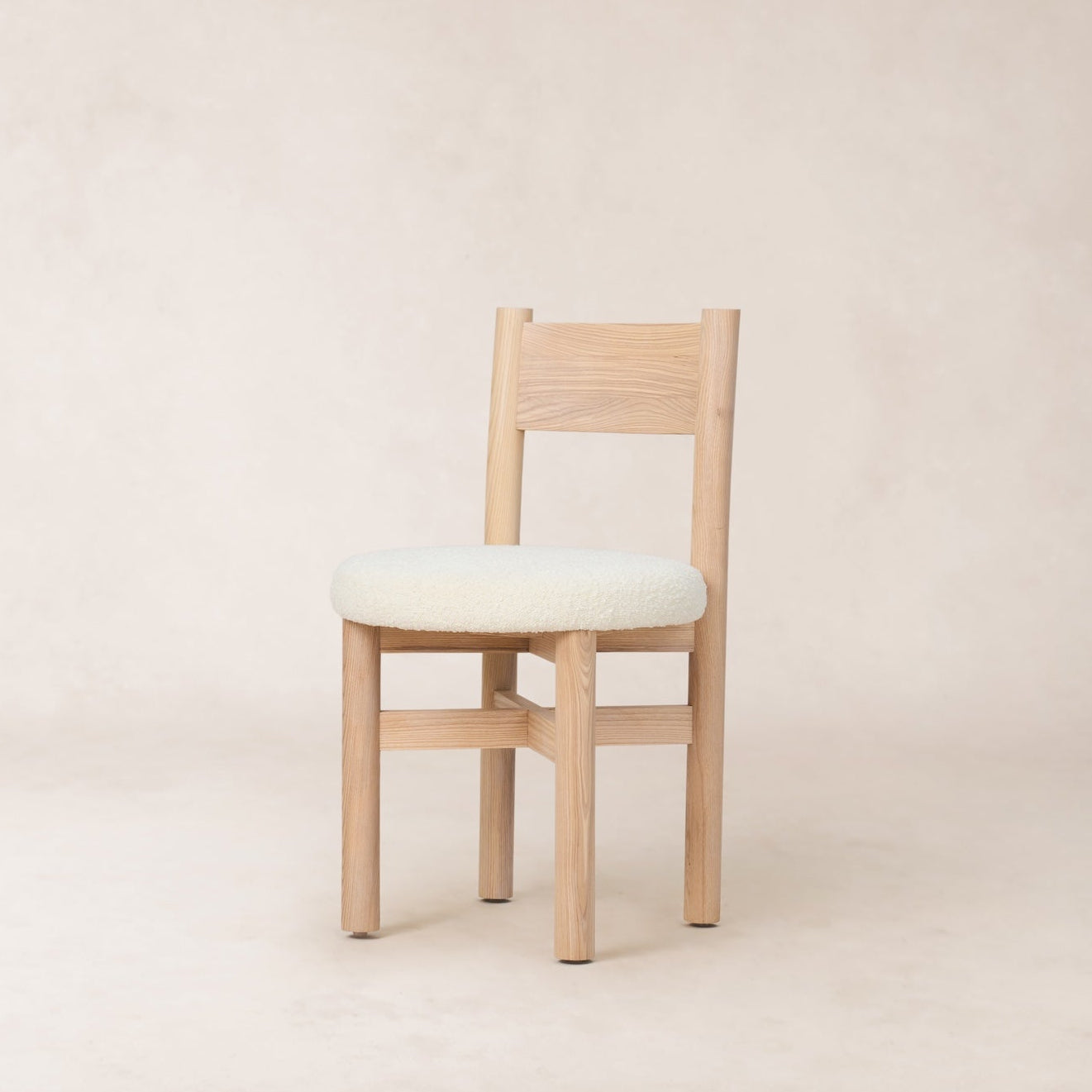 https://cdn.shopify.com/s/files/1/0593/2217/1565/files/natural-teddy-dining-chair-boucle-seat.jpg?v=1770070640