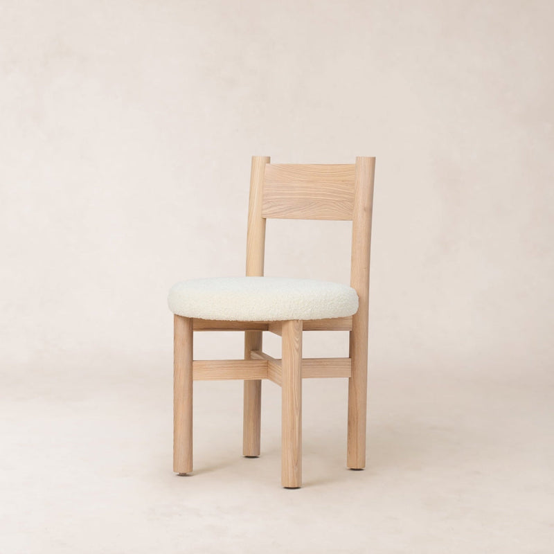 https://cdn.shopify.com/s/files/1/0593/2217/1565/files/natural-teddy-dining-chair-boucle-seat.jpg?v=1770070640