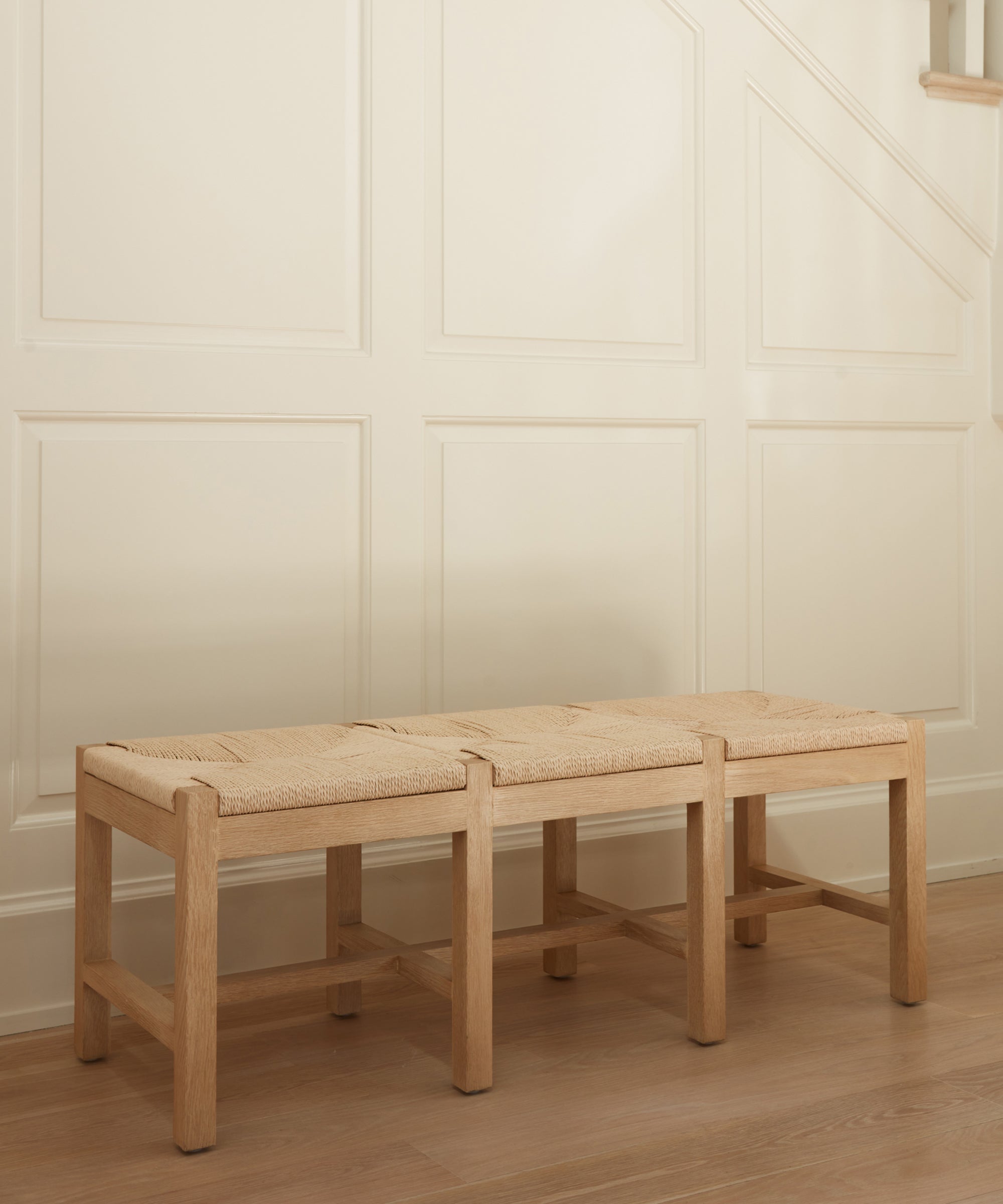 https://cdn.shopify.com/s/files/1/0565/1234/8333/files/oak-handwoven-danish-paper-montecito-bench-oak-1.jpg?v=1682454042