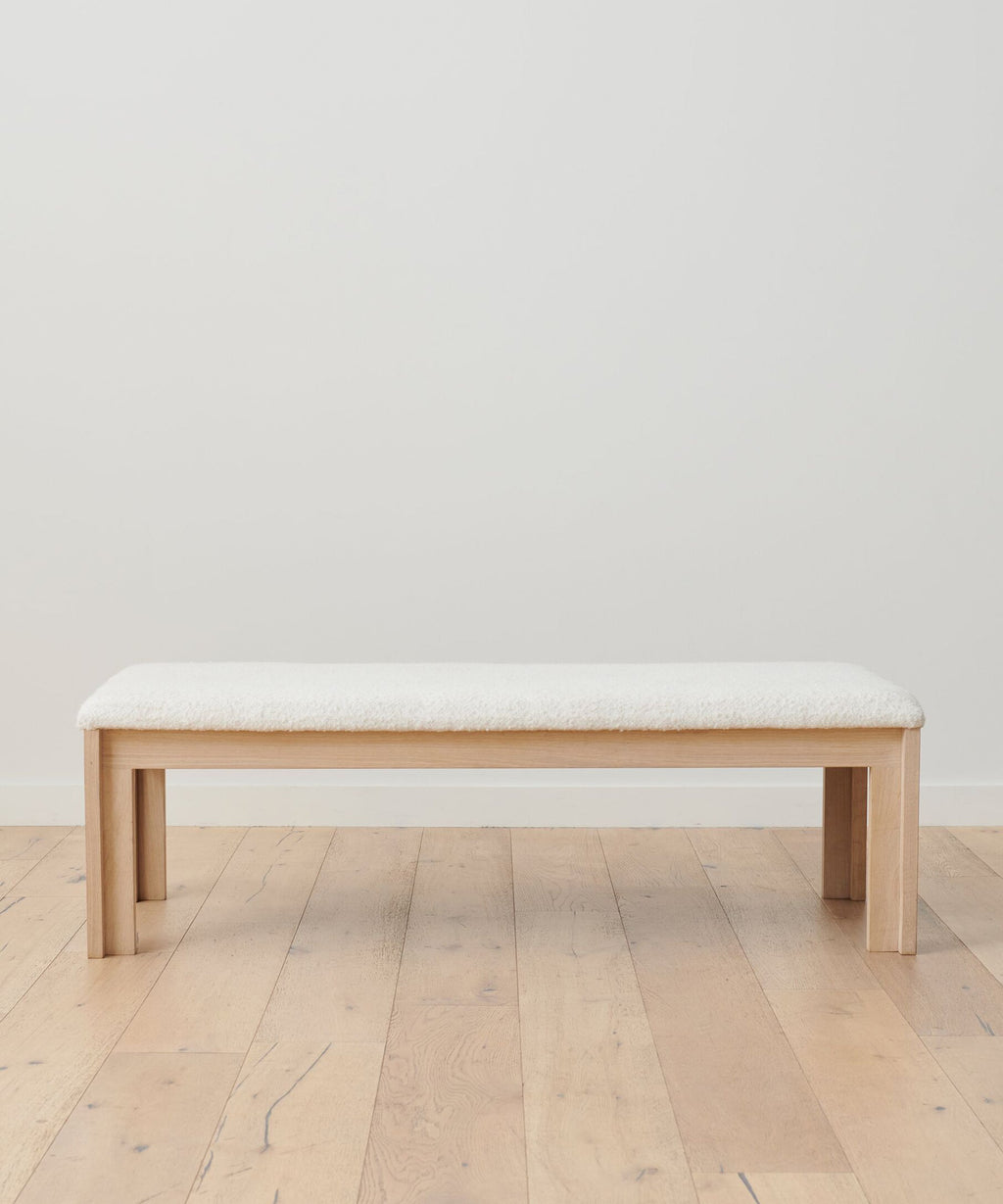 https://cdn.shopify.com/s/files/1/0565/1234/8333/products/otto-upholstered-wood-bench-ivory-wool-boucle-1.jpg?v=1762181960