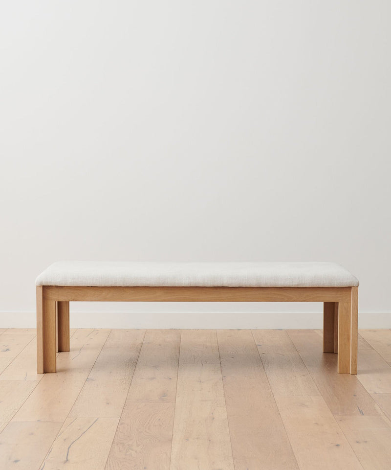 https://cdn.shopify.com/s/files/1/0565/1234/8333/products/otto-upholstered-wood-bench-natural-linen-1.jpg?v=1762181962