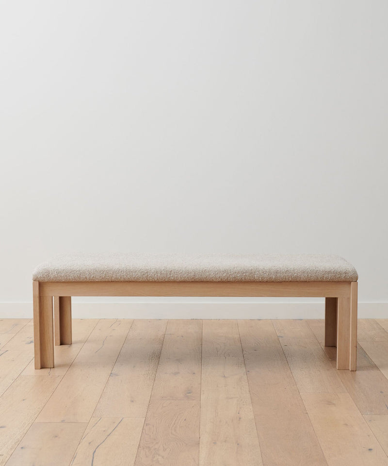 https://cdn.shopify.com/s/files/1/0565/1234/8333/products/otto-upholstered-wood-bench-natural-wool-boucle-1.jpg?v=1762181960