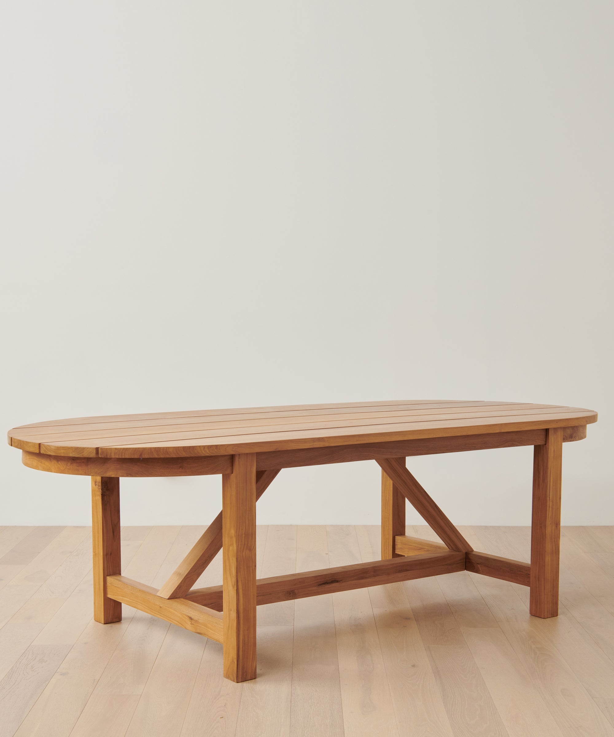 https://cdn.shopify.com/s/files/1/0565/1234/8333/files/outdoor-oval-montecito-dining-table-teak-1.jpg?v=1762183049