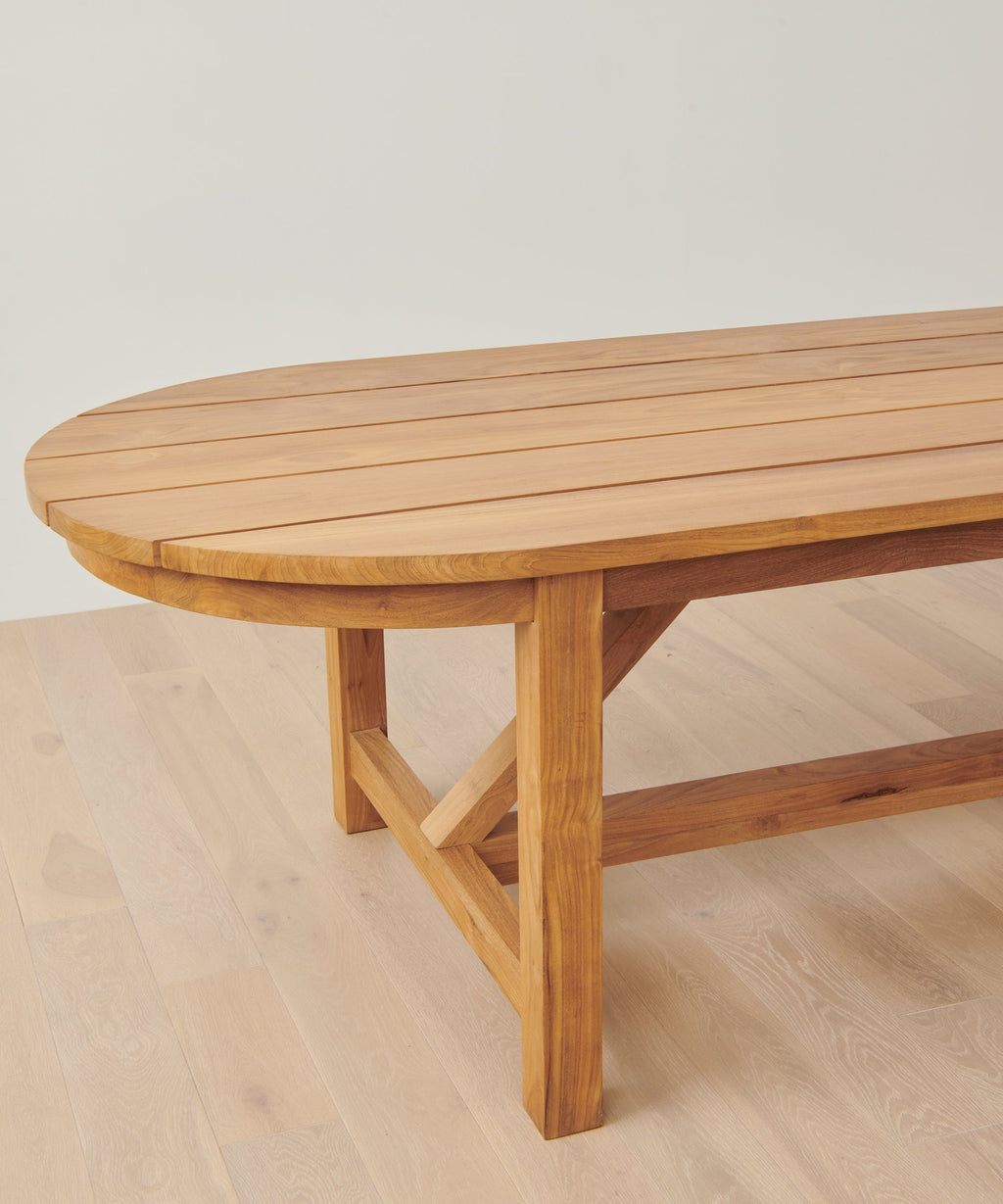 https://cdn.shopify.com/s/files/1/0565/1234/8333/files/outdoor-oval-montecito-dining-table-teak-2.jpg?v=1682458177