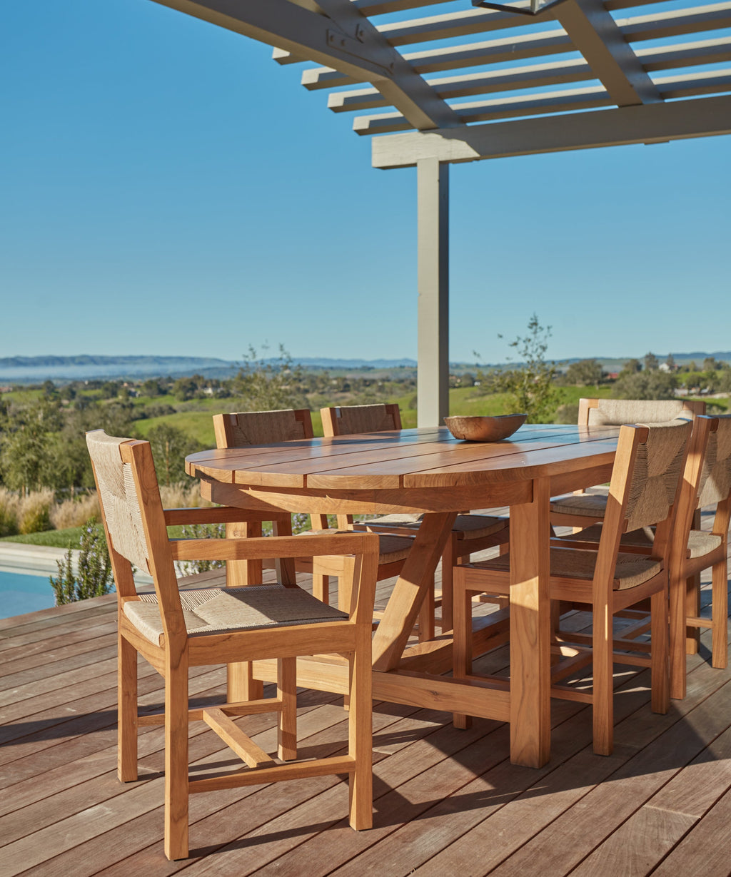 https://cdn.shopify.com/s/files/1/0565/1234/8333/files/outdoor-oval-montecito-dining-table-teak-4.jpg?v=1682458177