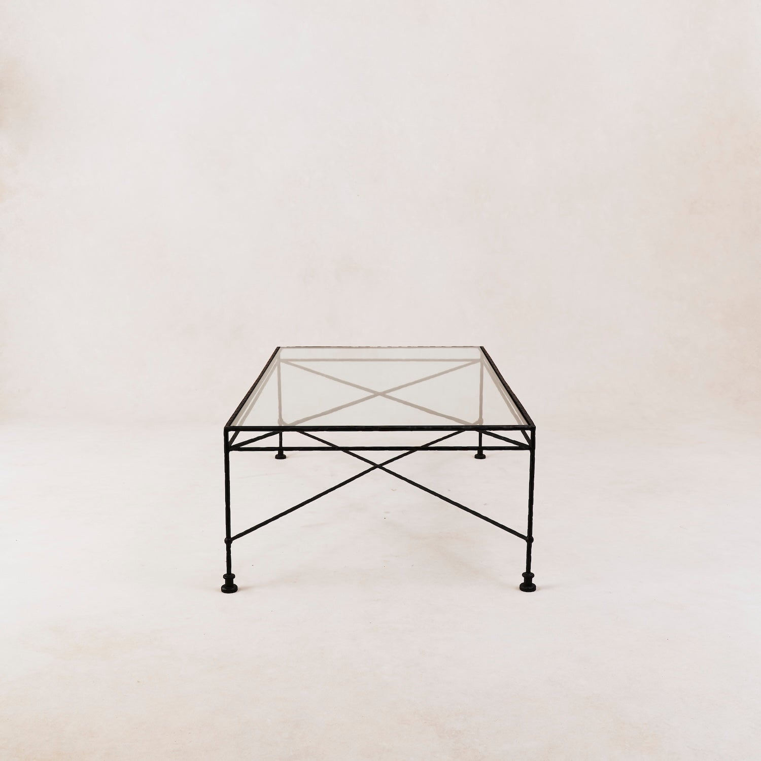 https://cdn.shopify.com/s/files/1/0593/2217/1565/files/outdoor-rectangular-glass-iron-coffee-table.jpg?v=1714686007