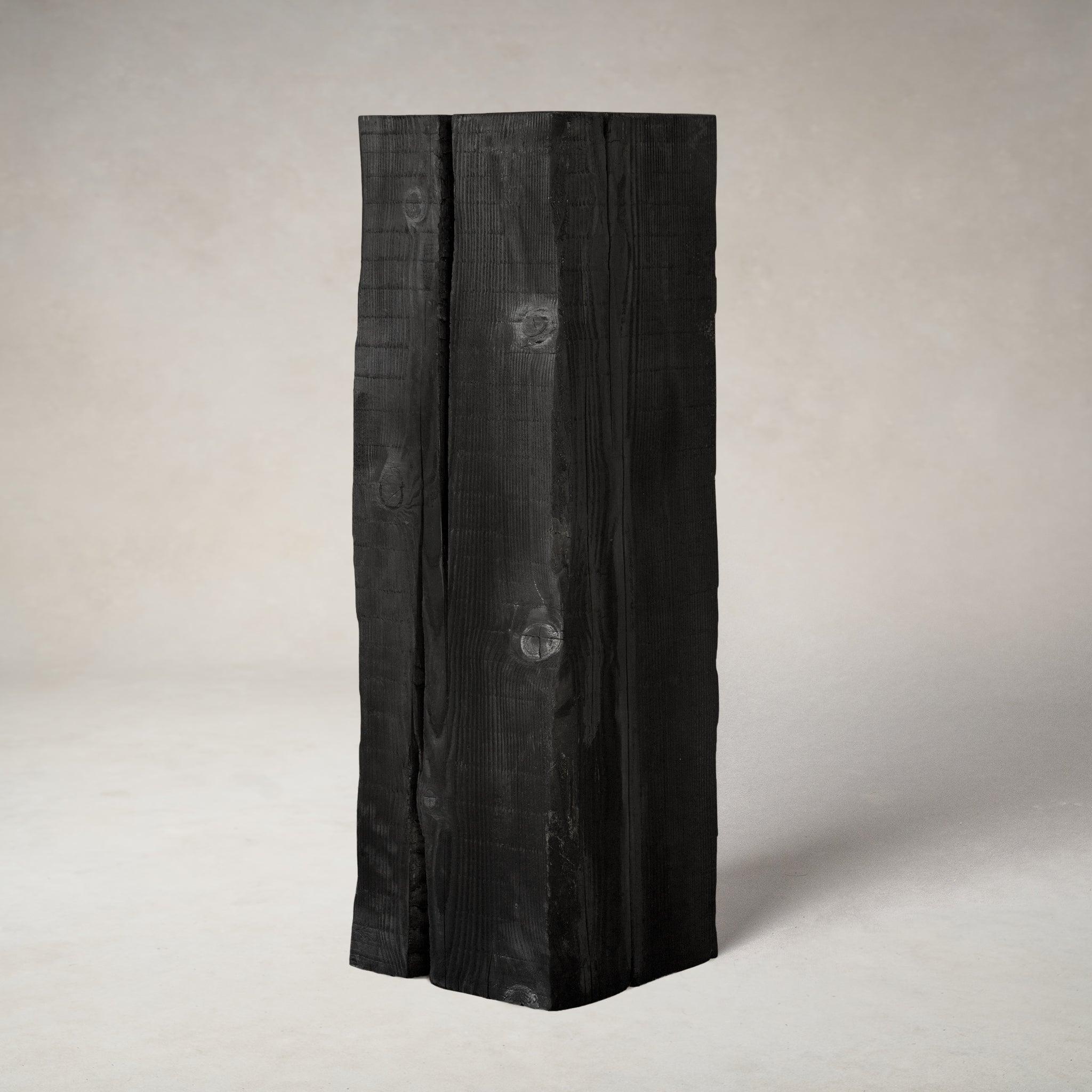 https://cdn.shopify.com/s/files/1/0593/2217/1565/products/sculpture-pedestal-charcoal-sculptural-pedestal-house-of-leon-537008.jpg?v=1716933526