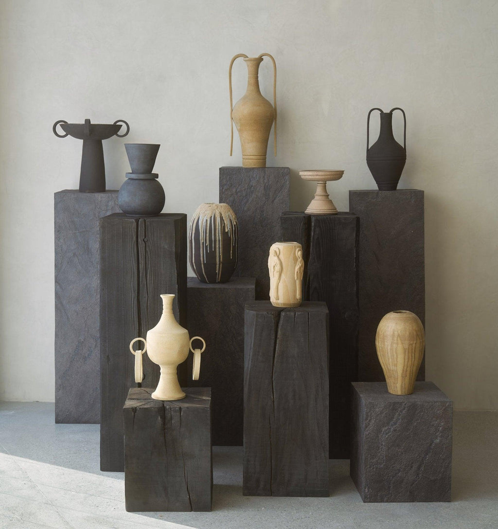 https://cdn.shopify.com/s/files/1/0593/2217/1565/products/sculpture-pedestal-charcoal-sculptural-pedestal-house-of-leon-841003.jpg?v=1716933526