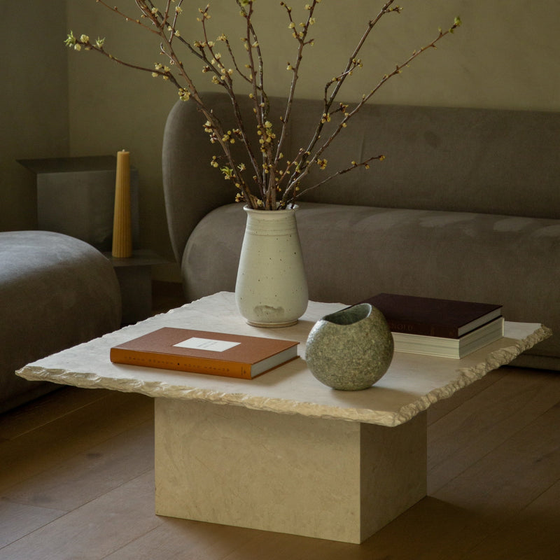https://cdn.shopify.com/s/files/1/0593/2217/1565/files/square-stone-coffee-table.jpg?v=1738263190