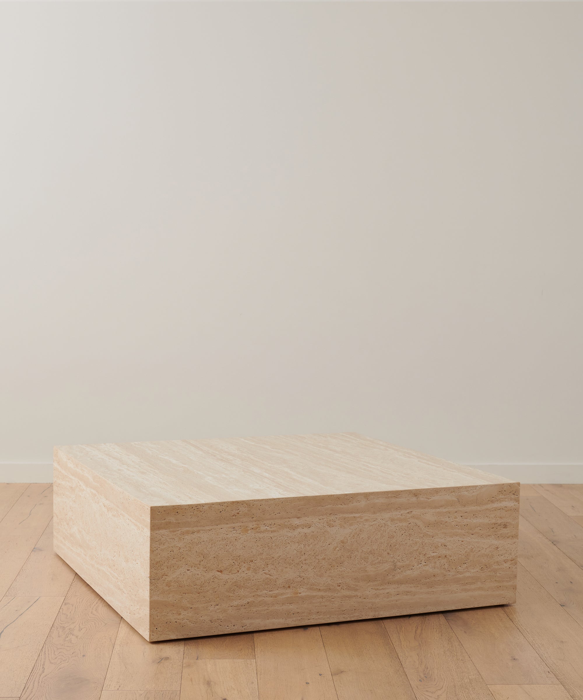 https://cdn.shopify.com/s/files/1/0565/1234/8333/products/sur-travertine-square-coffee-table-01.jpg?v=1762182832