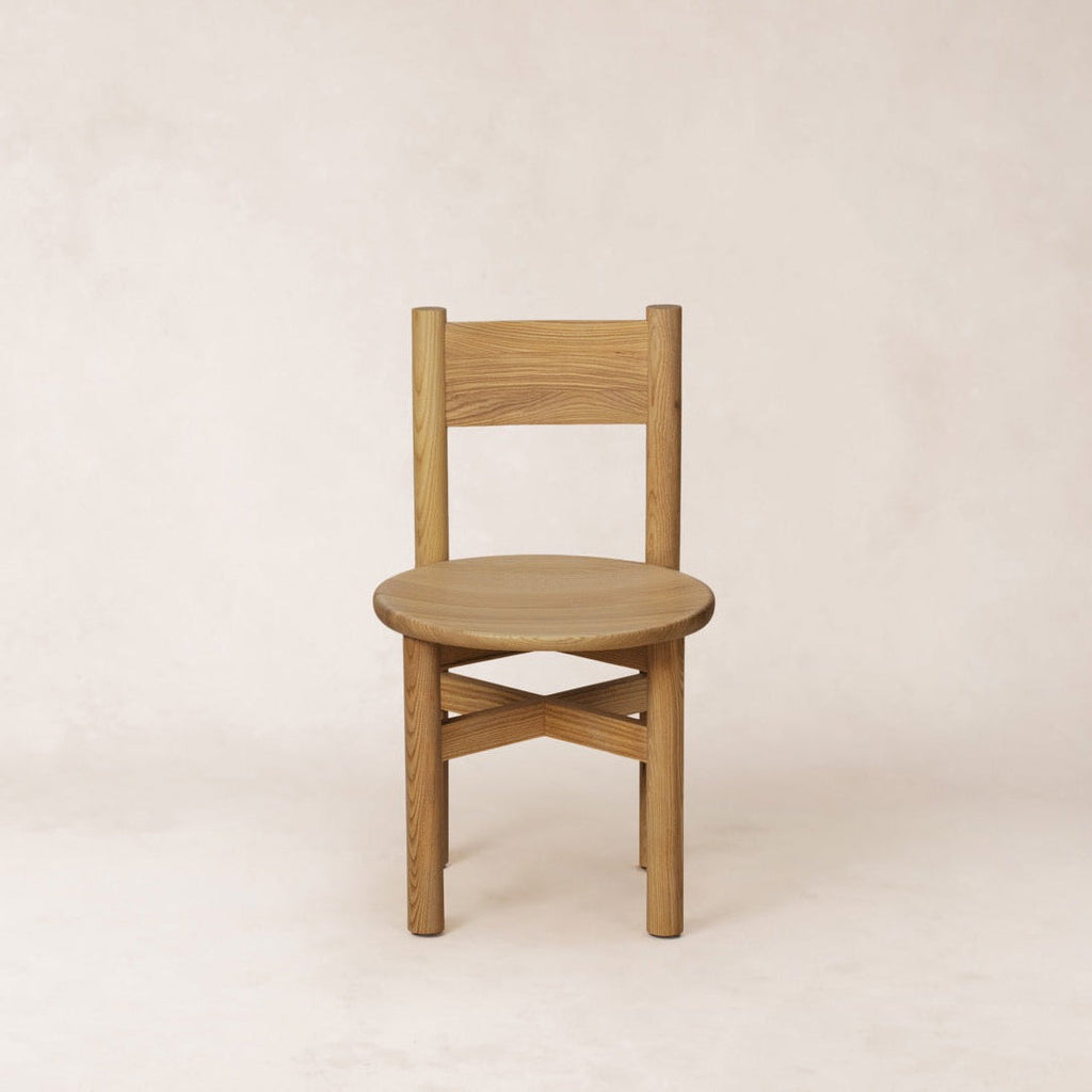 https://cdn.shopify.com/s/files/1/0593/2217/1565/files/teddy-wood-dining-chair-warm-oak1.jpg?v=1770070851