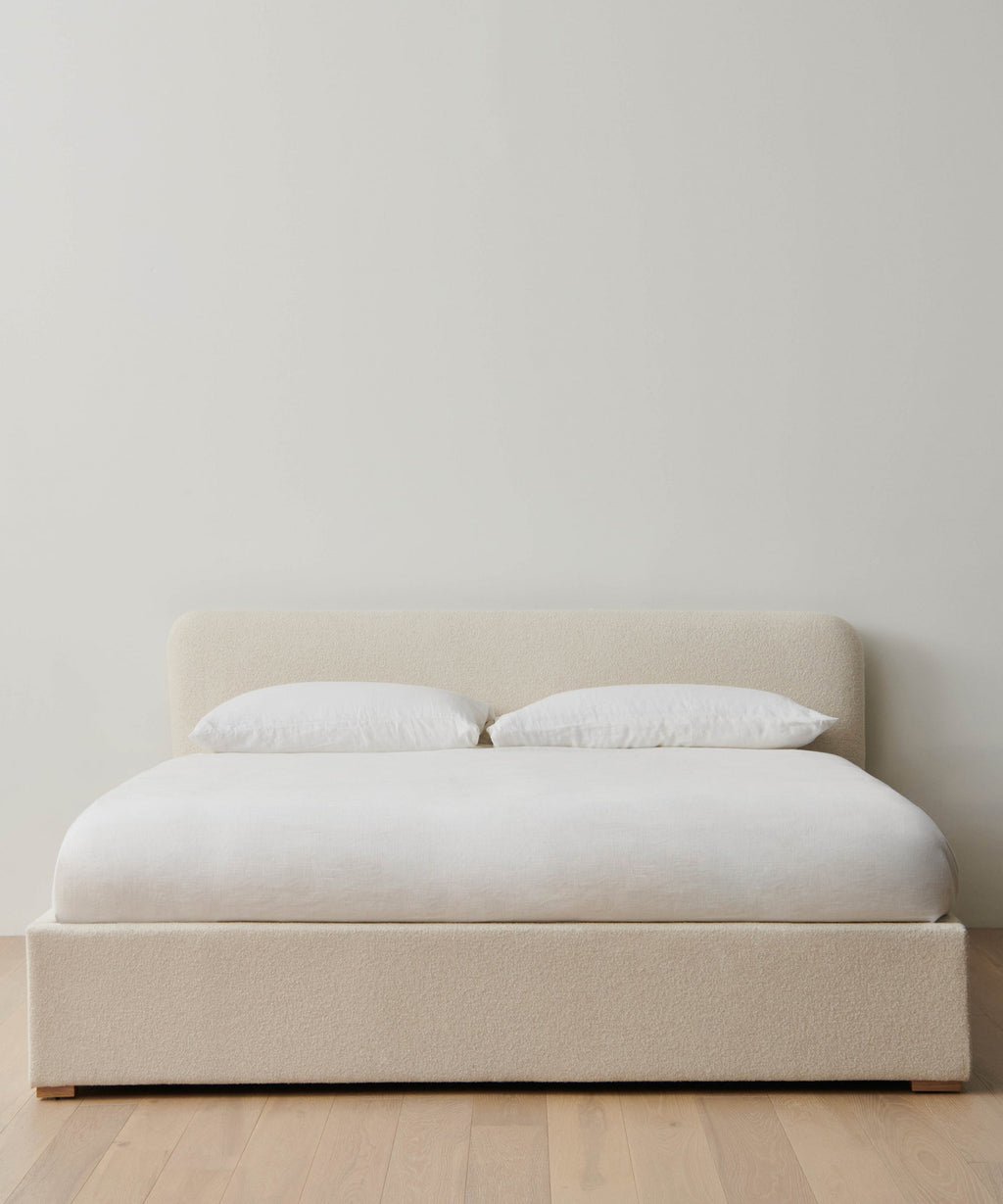https://cdn.shopify.com/s/files/1/0565/1234/8333/files/upholstered-cove-bed-oyster-mini-boucle-1.jpg?v=1744840917