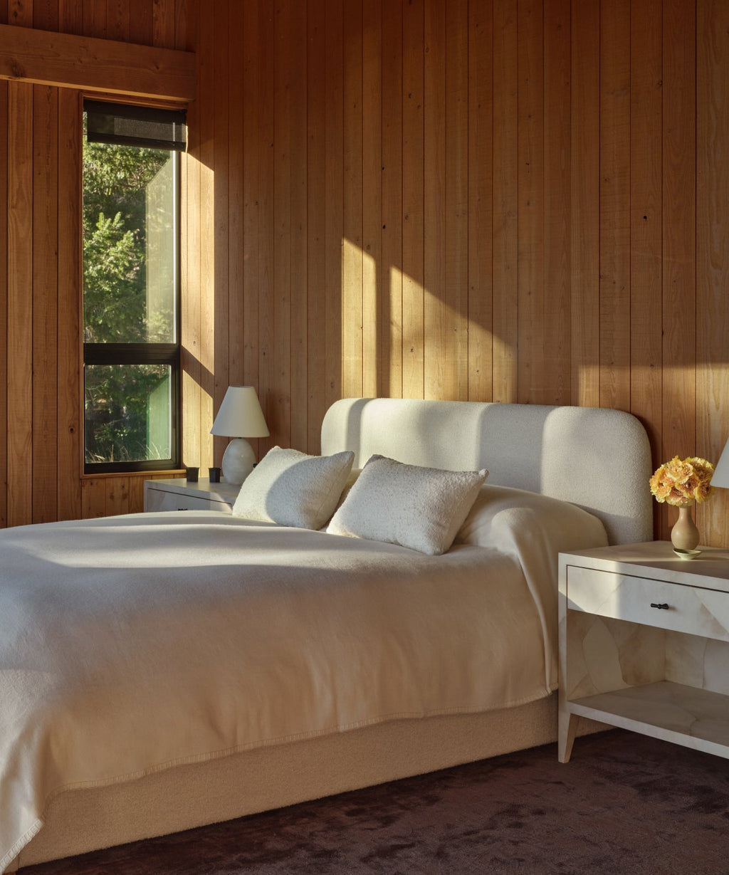 https://cdn.shopify.com/s/files/1/0565/1234/8333/files/upholstered-cove-bed-oyster-mini-boucle-v2-4.jpg?v=1762183261