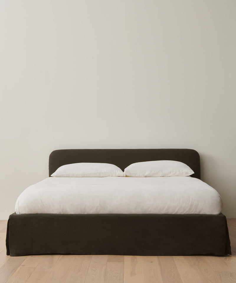 https://cdn.shopify.com/s/files/1/0565/1234/8333/files/upholstered-linen-cove-bed-jet-linen-01.jpg?v=1762182733